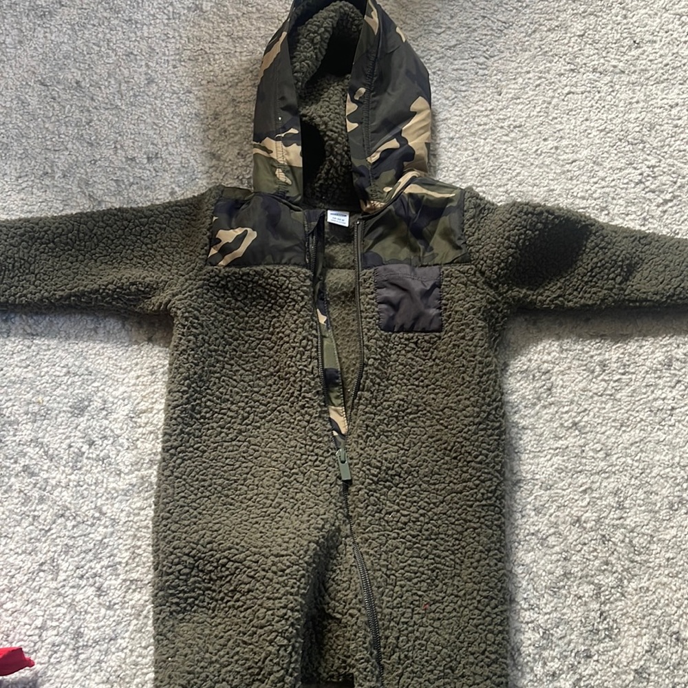 Green polyester zip up with attached army hood. Soft and warm for fall